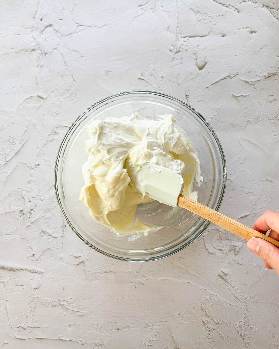 folding in the whipped cream with a spatula
