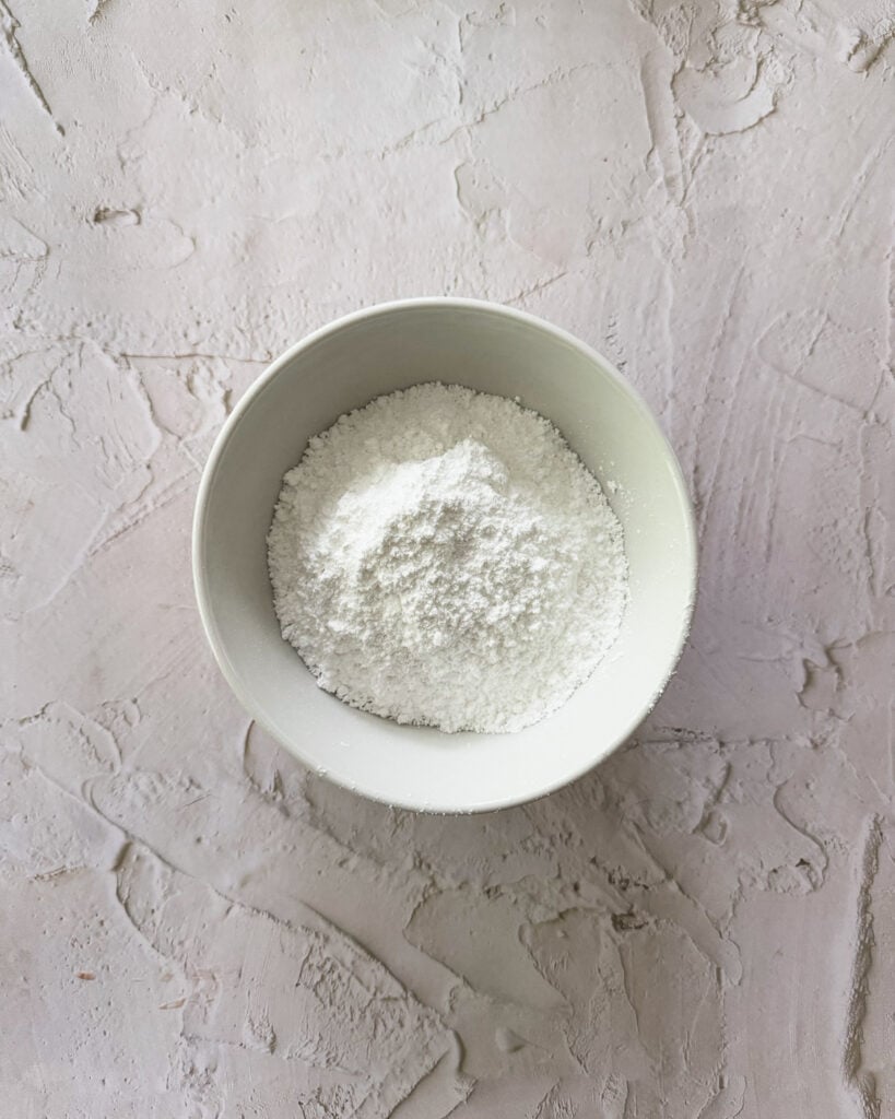 measured and sifted powdered sugar for drizzle
