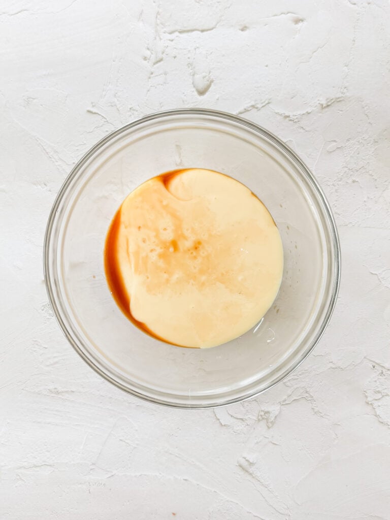 Mixing sweetened condensed milk, vanilla, and salt